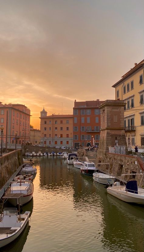 eating italian food in a small town in northern Italy during summer, dinner with a view, sunset during dinner, venice aesthetic Cute Small Town, Italy In Summer, Italian Sunset, Summer In Italy, Sunset Summer, Small Town, In Summer, Small Towns, Boats