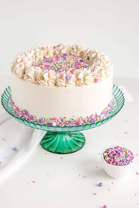 This Classic White Cake recipe pairs fluffy vanilla cake layers with a silky white Swiss meringue buttercream. | livforcake.com Classic White Cake, Best White Cake Recipe, 28th Birthday Cake, 28 Birthday, White Birthday Cakes, 60s Party, White Cake Recipe, Rainbow Birthday Cake, Wedding Cake Recipe