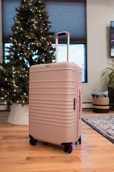 Is Beis luggage worth the hype? After traveling with the popular suitcase, I'm giving an honest Beis luggage review to help you decide.  pink Beis suitcases, pink hard shell luggage, best checked suitcases, best carry on suitcases, cute luggage brands, where to buy luggage, inexpensive luggage brands Beige Large Capacity Everyday Luggage, Beis Luggage, Beis Luggage Pink, Classic Beige Rectangular Luggage, Beige Rectangular Luggage For On-the-go, Functional Pink Luggage, Hard Sided Luggage, Pink Suitcase, Cute Luggage