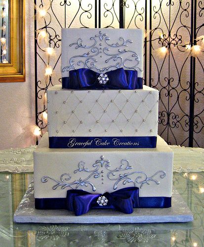 Elegant Square Wedding Cake with Purple Ribbon and Silver Scrolls Wedding Cake With Purple, Royal Blue Wedding Cakes, Square Wedding Cake, Cakes Elegant, Wedding Cakes Elegant, Square Wedding Cakes, Purple Wedding Cakes, Wedding Cakes Blue, Royal Blue Wedding