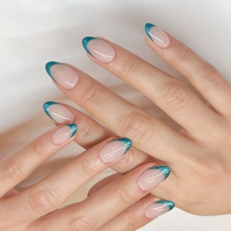 French mani, but make it ✨festive✨ with a pop of holiday color! @glossy.studios used #PutItInNeutral and #TealingFestive. 💅 #FrenchManicure #HolidayNails #NailInspo #NailTech #FrenchMani #FrenchTips Nails For Turquoise Dress, Prom Nails Turquoise, Teal Nail Tips, Light Teal French Tip Nails, Teal Chrome French Tip Nails, Teal Tips Nails, Nails For Teal Dress, Torquise Nails French Tip, Teal French Tip Nails Turquoise