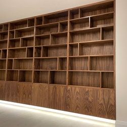 Introducing one of our latest project: a stunning bespoke bookcase made from rich, warm walnut wood. This beautiful piece is not only a functional storage solution for all your favourite books, but also a work of art that will enhance the aesthetic of any room. And that's not all - our bookcase also features dimmable led lights that allow you to adjust the brightness and set the perfect mood for reading or relaxation. With its elegant design and expert craftsmanship Bespoke Bookcase, Loft Conversion Wardrobes, Floor To Ceiling Wardrobes, Alcove Cabinets, Small Space Nursery, Bedroom Cabinet, Special Walnut Stain, Walnut Bookcase, Joinery Design