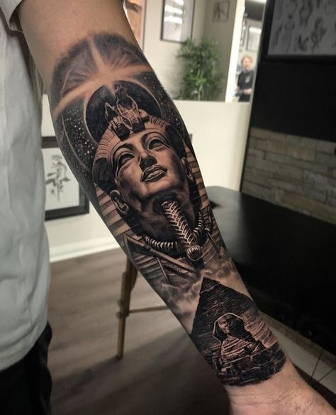 King Tut and Sphinx forearm tattoo King Tut Tattoo, Egypt Tattoo Design, Nefertiti Tattoo, Pyramid Tattoo, Half Sleeve Tattoo Stencils, Half Sleeve Tattoos Forearm, Egyptian Tattoo Sleeve, Anubis Tattoo, African Tattoo