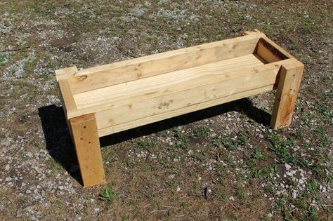 Easy to build hog trough, homemade pig feeder.  Directions on building a livestock feeder. Pig Trough, Goat Feed, Pig Shelter, Pig Feeder, Pig Waterer, Goat Feeder, Feed Trough, Livestock Shelter, Goat Pen