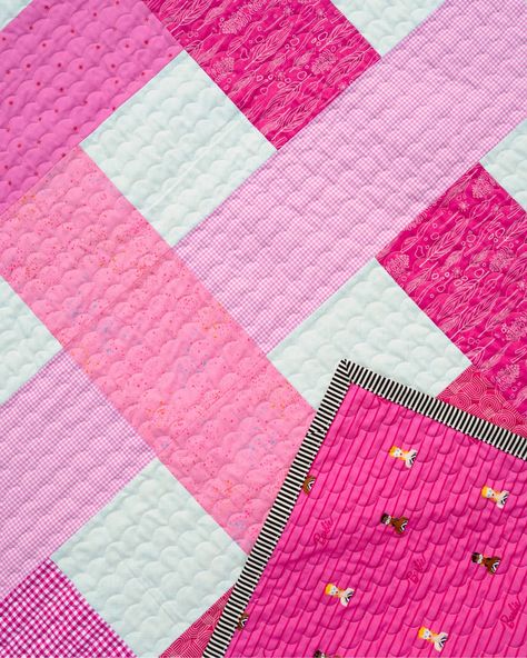 Introducing the first quilt in my new challenge (that I'm tentatively calling Quilt Roulette?)! 🎉 For this round, I pulled a theme and pattern from my bins and ended up with a Barbie-themed Betty Quilt! 💖 I combined the fun, modern aesthetic of the new Barbie movie with the iconic 1959 black-and-white swimsuit. And, of course, lots of PINK! 🌸 If you saw my post yesterday about trying to overcome the scarcity mentality, you can see where I got the idea for this project! Working with my stash... Barbie Quilt, The New Barbie Movie, Quilting Blogs, First Quilt, Black And White Swimsuit, New Barbie, Modern Inspiration, Table Quilts, Barbie Movie