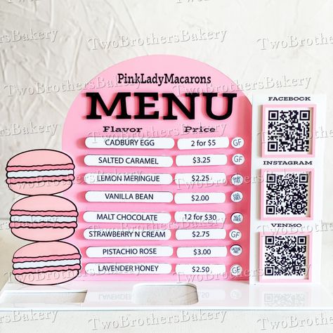 Elevate your macaron bakery's presence and streamline your sales process at farmers markets, fairs, and pop-ups with our specially designed Customizable Bakery Signage Set. Tailored for macaron bakers seeking an effective, on-brand way to display their offerings, this signage solution maximizes space without sacrificing style or functionality.**Product Features:**- **Durable Double Layer Acrylic Base:** Crafted from high-quality acrylic, our 15x5 inch base provides a sturdy foundation for your signage. It includes three slots for additional signs and offers the option to include a business card holder and/or a Square reader placement holder for your convenience.- **Three Customizable Vertical Signs:** - **Macaron Stack Sign:** A visually captivating stack of three macarons, approximately 6 Market Signage Ideas, Macaron Booth Display, Sweet Shop Sign, Macaron Vendor Booth, Macaron Farmers Market Display, Bakery Pop Up Shop Display, Pop Up Bakery, Bakery Farmers Market Display, Farmers Market Bakery Display