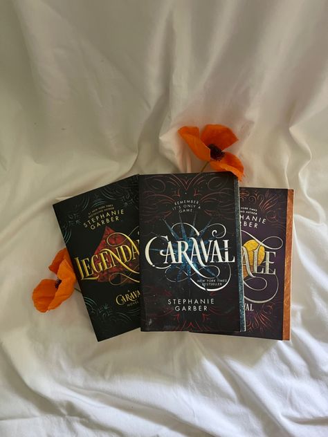 The Caraval Series books laid down against white with orange flowers. Booktok Book Covers, Carnaval Book, Carnival Book, Viral Books, Caraval Trilogy, 40 Book Challenge, Greek Mythology Books, Caraval Series, Tbr Books