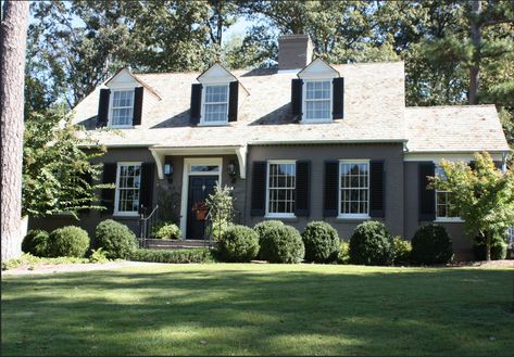 Three dormer cape cod with front door awning House With Black Shutters, American Settlers, Brick House Colors, Cape Cod Exterior, Cape Cod House Exterior, Modern Cape, Painted Brick Exteriors, Gabled Roof, Kitchen Porch