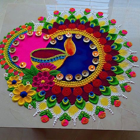 Rangoli Design With 3 Colours, Best Rangoli Designs Colourful, Alpana Designs Colourful, Two Colours Rangoli Designs, Round Rangoli For Diwali, Rangoli Designs Beautiful Unique, Ranglo For Diwali, Cracker Rangoli, Diy Diwali Rangoli Designs