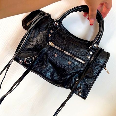 Black Balenciaga mini city bag. Balenciaga Small City Bag Outfit, Balenciaga Mini City Bag Outfit, Mini City Balenciaga, Balenciaga City Bag Mini, Mini Balenciaga Bag, Balenciaga Small City Bag, Balenciaga Mini Bag, Balenciaga Mini City Bag, Black Bag Outfit