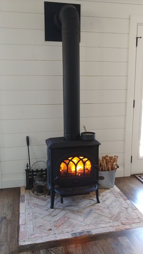 Cabin Stove Wood Burning, Wood Stove Kettle, Wood Burning Stove Sunroom, Wood Stove In Corner Of Living Room, Wood Stove Bedroom, Tiny Home Wood Stove, Wood Stove Inside Fireplace, Brick Hearth Wood Stove, Wood Stove Base