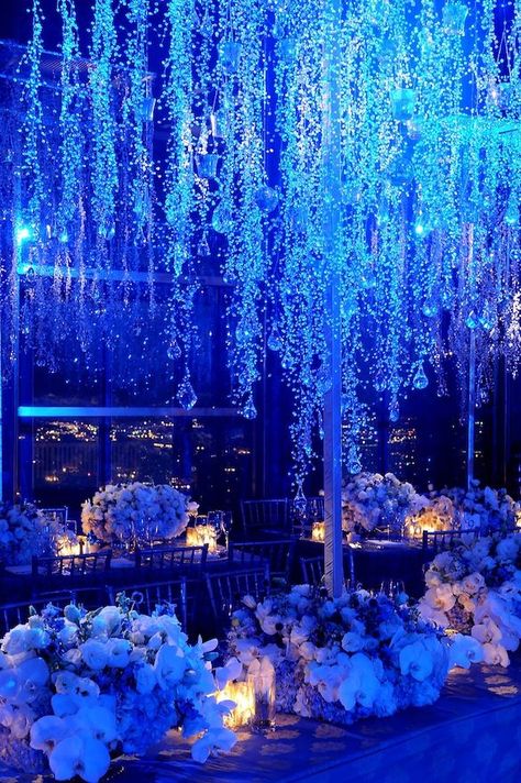 "We love the way icicles capture such a delicate moment.  This concept of an evening being frozen in time brought us to our winter theme for an evening affair. We dripped clear crystals from our tree structure and projected blue lights on them from above.  This gave our icicles an illuminated effect against the dimly lit space." Preston Bailey: Winter Wonderland Wedding Decorations, Wonderland Wedding Decorations, Frozen Wedding, Wedding Themes Winter, Blue Lights, Winter Wedding Decorations, Royal Blue Wedding, Winter Wonderland Wedding, Wonderland Wedding