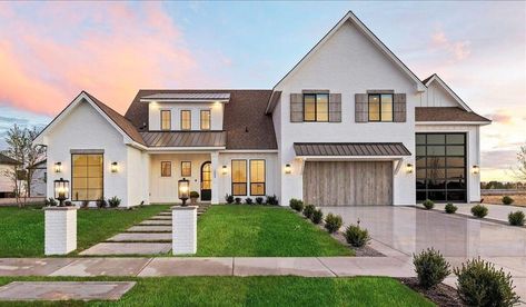 A fresh take on your home's exterior can make a significant difference, especially with brown roofing. Pairing white accents enhances the overall look while offering a timeless appeal. The crispness of white against rich brown shingles creates an eye-catching contrast that draws attention. Imagine complementing this setup with gray tones in features like reclaimed wood doors, adding warmth and character to your space without overwhelming it. This combination not only revamps aesthetics but also reflects modern trends in home design effortlessly. House Wood Accents Exterior, White House Wood Accents, White House Wood Accents Exterior, Brown Roof Exterior, Brown Shingles, Brown Roof Houses, Stucco Colors, Reclaimed Wood Door, White Siding