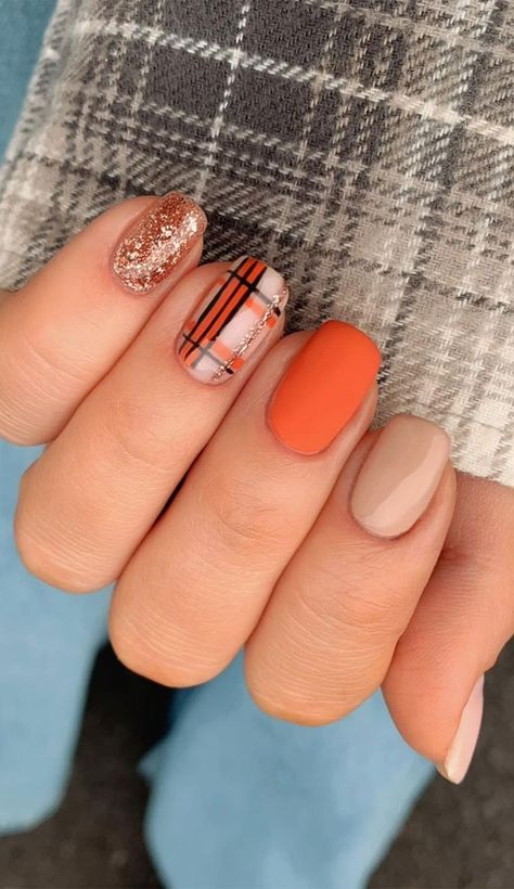 2. Mix and Match Plaid Nail and Fall Colors Nails When it comes to fall fashion, plaid/tweed jackets are a must have so does... Cute Short Thanksgiving Nails, Orange Fall Nails 2022, Autumn Holiday Nails, Psl Nails, Autumn Nails Colors Orange, Matte Orange Nail, Orange Plaid Nails, Classy Autumn Nails, Cute Nails For Fall Short