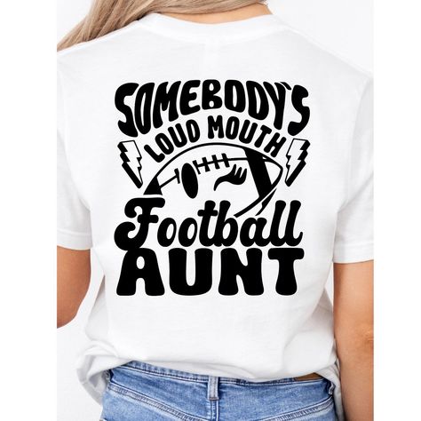 Somebody's loud mouth Football Aunt Shirt, Football Aunt Shirt, Football Shirt, Aunt Shirt, Sports Aunt Shirt, Aunt Sweatshirt 🎁 THE PERFECT GIFT FOR EVERYONE YOU LOVE 🎁 Surprise your friends, family, and loved ones with affordable, high-quality, personalized t-shirts. Each shirt is carefully hand-printed using the latest technology and eco-friendly, water-based inks. Thank you for choosing us! 💖 FINDING YOUR PERFECT SIZE 💖 Please refer to the size chart in the photos. We offer measurements for different clothing types and sizes. These shirts are unisex, so if you order your usual women's size, expect a looser fit. Note that the size chart measurements are not circumference. Clothing brands may vary depending on stock availability. 🛒 HOW TO ORDER 🛒 Carefully read all the information Football Auntie Shirts Ideas, Football Aunt, Love Surprise, Aunt Sweatshirt, Aunt Shirt, Mom Accessories, Auntie Shirts, Aunt Shirts, Shirts Ideas