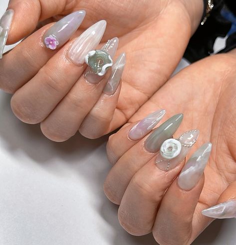 💜 Orchid Garden 🤍 Medium Stiletto Gel-X with foreign removal and complimentary hand massage for a 2.5hr session ♡ Client’s inspo request was for a muted jade theme with the addition of my orchids ☺️🌸 February spots available, please DM to book ✨ #nailinspo #naildesign #3dnailart #jadenails #snakenails #orchidnails #vancouvernails #3dnails #gelxinspo #gelxnails #trendynails #nails2inspire #pinterestnails #stilettonails Orchid Nails, Medium Stiletto, Jade Nails, Orchid Garden, Orchids Garden, Hand Massage, 3d Nail Art, 3d Nails, Stiletto Nails