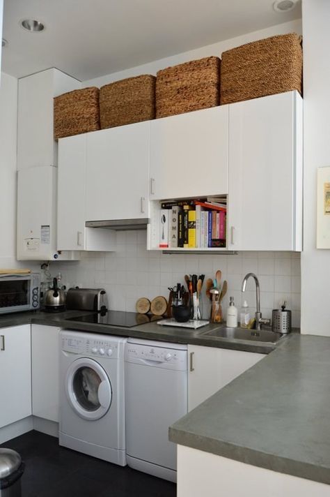 Wicker baskets can work, too. | 17 Ways To Squeeze A Little Extra Storage Out Of A Tiny Kitchen Above Cabinet Storage, Dishwasher Liquid, Top Of Kitchen Cabinets, Small Space Inspiration, Tiny Kitchen Design, Paris Kitchen, Above Kitchen Cabinets, Above Cabinets, Kitchen Cabinet Storage