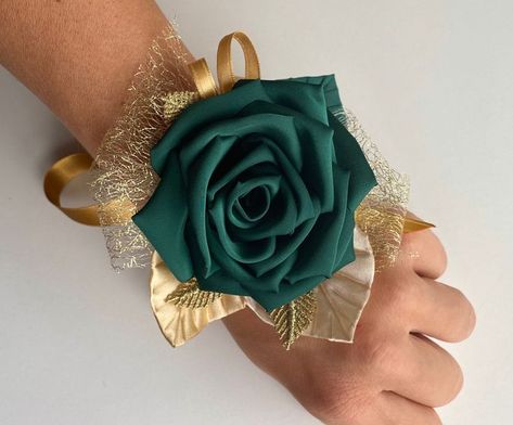 Emerald Green and Gold Wrist Corsage Gold Corsage Prom, Green Fall Weddings, Emerald Wedding Colors, Gold Corsage, Green Boutonniere, Wrist Corsage Prom, Prom Corsage And Boutonniere, Emerald Green Prom Dress, Emerald Green And Gold