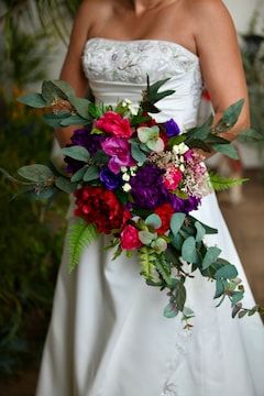 Jewel Tone Rainbow Peony Wedding Bouquets Custom Purple Red - Etsy Bright Cascade Wedding Bouquet, Jewel Tone Wedding Flowers Bouquets, Jewel Tone Wedding Decor Table Settings, Jewel Tone Flowers Wedding, Jewel Tone Wedding Centerpieces, Fuschia Wedding Flowers, Fall Jewel Tone Wedding, Jewel Tone Wedding Bouquet, Gem Tone Wedding