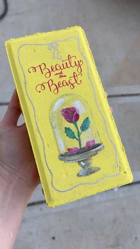 Melani Alberts | Should i add more brick paver books to my garden library? This time we had Beauty and the Beast. Bricks: @homedepot markers:… | Instagram Painted Bricks Crafts, Brick Crafts, Garden Library, Serenity Garden, Brick Art, Brick Pavers, Garden Painting, Painted Brick, Easy Diy Art