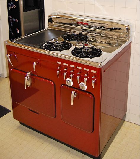 1950s Chambers "B " Range in Candy Apple Red.  Dutch Oven Cooking allows baking with the gas turned off holding temperature for almost 2 hours. Deep well "crock pot," Griddle with Broiler under griddle.  Child proof safety technology Chambers Stove, Brown Kitchen Cabinets, Retro Appliances, Cooking Range, Vintage Kitchens, Vintage Stoves, Antique Stove, Dutch Oven Cooking, Vintage Appliances