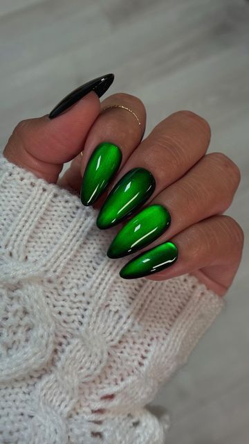 Daily Charme Official on Instagram: "Viral Red Glass Nails, but make them holiday green! 💚🎄✨ These are giving Elphaba from Wicked vibes, do you want to see a pink version for Glinda? 💖Comment “GLASS NAILS” for a direct link to everything you need to create this cat eye look 🔗

Save & share for the ultimate holiday nail inspo! 🎁💅

Using @daily_charme:
• Almond Medium B+W Charme Gel Extension Tips
• 001 Perfect Black
• C09 Mooncat or C92 Figaro
• T07 Abs*nthe 
• Strong Cat Eye Magnetic Cylinder
• Diamond Shine Top Coat 

#christmasnails #glassnails #cateyenails #holidaynails #festivenails #greennails #nailartinspo #holidayvibes #nailtutorial #diynails #winternails #greenglassnails #christmas2024 #trendynails #nailartdesigns #nailgoals #bratnails #nailaddict #nailsoftheday #seasonalnail Holiday Glass Nails, Elphaba Nails Wicked, Green Glass Nails, Emerald Green Cat Eye Nails, Green Holiday Nails Christmas, Green Magnetic Nails, Red Glass Nails, Elegant Green Nails, Chrome Green Nails