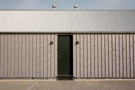 The Architect Is In: A Budget Barn in Wales - Remodelista Rural Office, Corrugated Metal Roof, Wood Facade, Steel Barns, Modern Shed, Corrugated Roofing, Exterior Paint Colors For House, Timber Cladding, Shed Homes