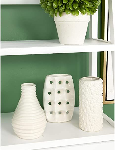 CosmoLiving by Cosmopolitan 92563 Modern Style Alabaster White Ceramic Vases with Pierced Grid, Knotted, and Ridged Finishes | Set of 3: 4” x 8”, 5” x 8”, 6” x 8” Ceramic Framed, Alabaster White, Cosmoliving By Cosmopolitan, White Ceramic Vases, White Vase, Unique Vases, Modern Vase, Vase Centerpieces, Table Vases