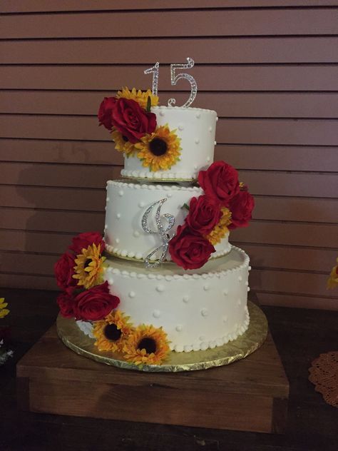 Sunflowers and red roses quince cake. Sunflower And Rose Quinceanera Dress, Red Cakes For Quince, Sunflower And Roses Centerpieces, Red And Yellow Quinceanera, Simple Quinceanera Cakes, Sunflower And Roses Quinceanera Theme, Red Quince Cake Ideas, Red Cake For Quinceanera, Quinceanera Sunflower Theme