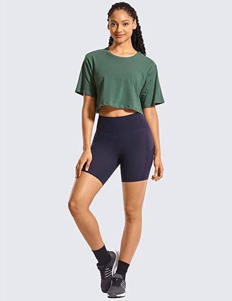 This top comes in 40 colors and ranges from size XXS-XL. It's made with 92% Pima Cotton and 8% Spandex. It's super soft, lightweight, skin-friendly and breathable. It's got a loose fit and sleeves half sleeves. #ad Crz Yoga, T Shirt Crop Top, Tops Short Sleeve, Gym Clothes Women, Workout Crop Top, Athletic Running, Casual Athletic, Loose Fitting Tops, Yoga Shirts