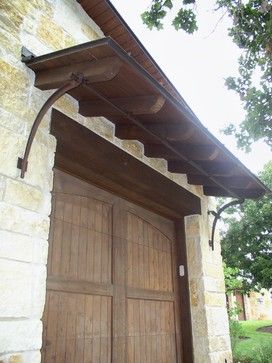 GARAGE DOOR    Mediterranean Home Design, Pictures, Remodel, Decor and Ideas - page 275 Brackets Ideas, Door Overhang, Roof Brackets, Roof Canopy, Metal Awning, Mediterranean Exterior, Door Awnings, Door Canopy, Wooden Front Doors