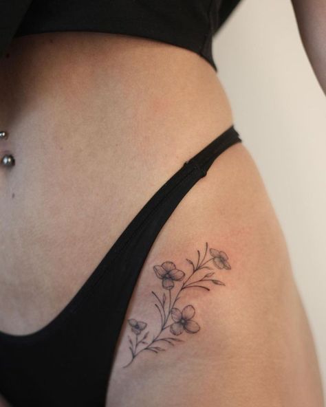 You know what's worse than having a messed up tattoo design on your skin forever? Getting called out about that epic fail online. Dainty Flower Tattoos Hip, Violet Hip Tattoo, Flower Tattoo On Hip Bone, Marigold Hip Tattoo, Minimal Hip Tattoos Women, Thigh Small Tattoos Women, Small Inner Thigh Tattoos, Inside Hip Tattoo, Flower Tattoos Aesthetic