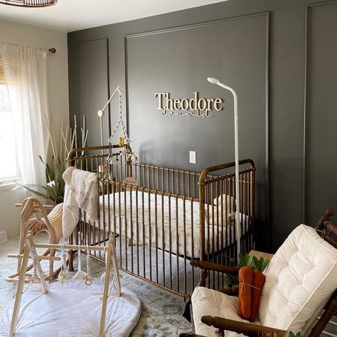 Gold And Wood Nursery, Gatsby Nursery, Dark Neutral Nursery Ideas, Dark Green And Gold Nursery, Nursery Accent Wall Color, Good Crib Nursery, Dark Nursery Walls, Nursery With Gold Accents, Gray And Gold Nursery