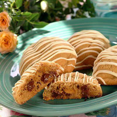 Hidden Treasure Cookies are sure to please kids of all ages! An irresistible combination of peanut butter and chocolate make this the perfect after-school snack with a glass of milk! Recipe created by Carol Gillespie, Chambersburg, PA. Treasure Cookies, Classic Snowball Cookies, Best Baking, Toll House, Peanut Butter Chocolate Chip Cookies, Peanut Butter Filling, Hidden Treasure, Peanut Butter Chocolate Chip, Creamy Peanut Butter