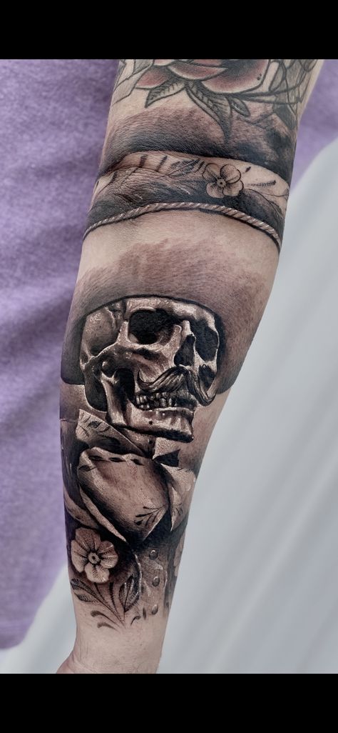 Mariachi skull by Faisal Al-lami @tattoo.sal #tattoos #skull #mariachi #mexican #art #tattoos #blackandgreytattoo Thigh Script Tattoo Men, Mexican Sleeve Tattoo Men, Ranchero Tattoo, Skeleton Mariachi Tattoo, Charra Tattoos Mexican, Charro Tattoo Mexican, Mexican Sleeve Tattoo, Mexican American Tattoos, Skull Mariachi