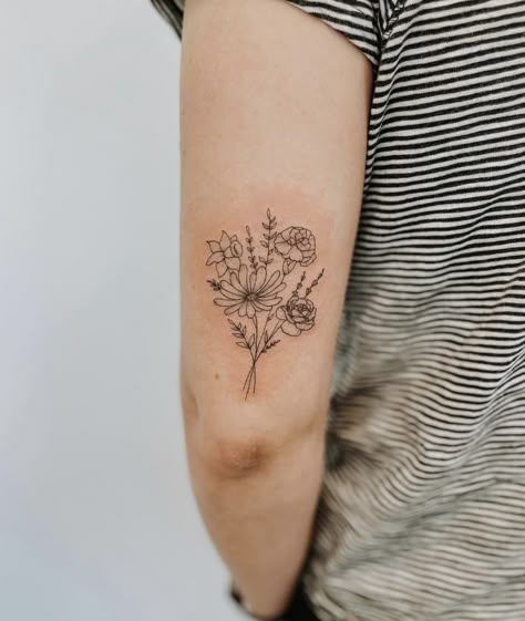 Bouquet Tattoos For Women, Back Of Arm Birth Flower Tattoo, Flower On Back Of Arm Tattoo, Tricep Flower Tattoo Women, Tattoo Ideas Flower Bouquet, Flower Bouquet Tattoo Upper Arm, Flower Bouquet Tattoo Bicep, Butterfly Flower Bouquet Tattoo, Floral Bouquet Tattoo Forearm