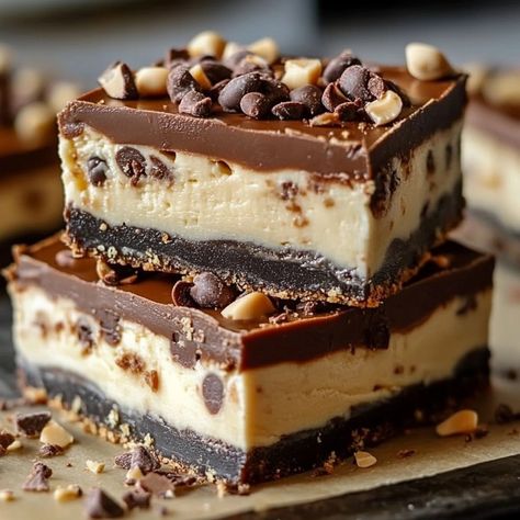 Decadent No-Bake Buckeye Cheesecake Bars Recipe: A Chocolate Lover's Dream! Reese’s Cheesecake Bars, No Bake Buckeye Cheesecake, No Bake Buckeye Cheesecake Bars, Clark Bars Recipe, Buckeye Cheesecake Recipe, Chocolate Cream Cheese Bars, No Bake Squares, Easy Dessert Recipes No Bake, Buckeye Cheesecake Bars