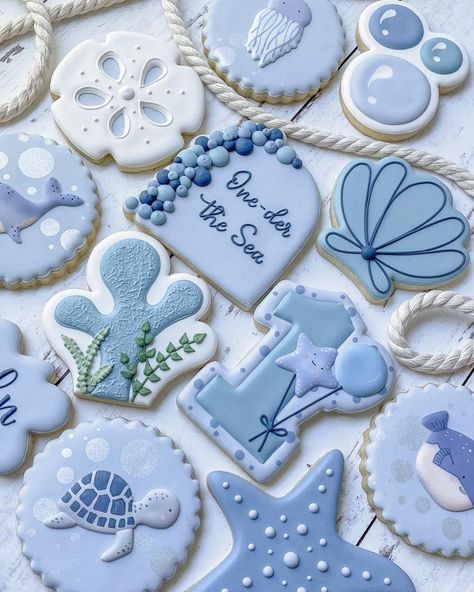 Krissy’s Cookies on Instagram: “One-der the Sea birthday cookies for a one-derful baby boy 🐳 Happy first birthday Lincoln! 🎂 (Sea creature inspo from birthday…” One Der The Sea Cookies, Under The Sea Cookies 1st Birthday, Oneder The Sea 1st Birthday Cookies, Oneder The Sea Cookies, One Der The Sea First Birthday Boy, Under The Sea First Birthday Boy, One Der The Sea First Birthday, Oneder The Sea 1st Birthday Boy, One Der The Sea