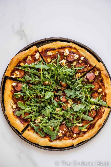 We've come to learn that some foods, like this chorizo pizza, really can make life better. Caramelized onions, chorizo, and goat cheese are a delicious threesome of ingredients that can't be beat. It's an easy pizza recipe for weeknights, and it's ready in just 30 minutes! #theendlessmeal #pizza #chorizo #chorizopizza #pizzarecipe #dinner How To Make Chorizo, Pizza Chorizo, Chorizo Pizza, Types Of Pizza, Make Life Better, Pizza Sauce Homemade, Pizza Recipes Easy, Pizza Flavors, Chorizo Sausage