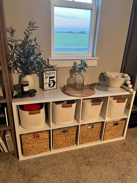 Perfect place to store all our board games. 16 Cube Shelf Decor, Living Room Cubby Decor, Board Game Storage Basement, 8 Cube Storage Ideas, Board Games Storage Living Room, Cubical Storage Ideas Cube Organizer, Board Game Corner In Living Room, Cute Cubby Ideas, Storage Cubes Bedroom