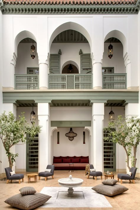 Arches and columns with fountain in the courtyard at Riad Azca, in Marrakech, Morroco #lecollectionist #luxuryhomes #homedesign #homeexterior #houseexterior #moroccaninteriors #moroccandecor Ocean Inspired Bedroom, Moroccan Hammam, Moroccan Houses, Moroccan Riad, Riad Marrakech, Classic House Exterior, House Design Exterior, Marrakech Morocco, Patio Interior