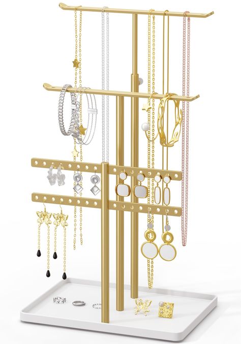 PRICES MAY VARY. 3-Tier Jewelry Stand : This holder has 3 tiers and 5 bars. Large Capacity & Well organized Easy to Assemble : Few steps to assemble, including required accessorys, and no need for additional tools. Extra Sturdy : Jewelry stands are made of metal, and the base is made of wooden. Ideal Gift : Ideal gifts for lovers, mother etc... Worry-free Service : One-year warranty guarantee! If you have any questions, pls contact us! Jewelry Stand Holder 5 bar Jewelry Hangers For Wall, Stand For Accessories, Gold Jewelry Display, Jewelry Organizer Earrings, Gold Jewelry Holder, Jewerly Organizer Ideas Bedroom, Jewlrey Organization, Jewelry Organizer Aesthetic, Gold Jewelry Stand