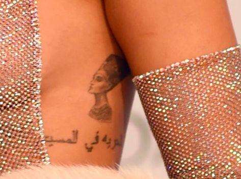 Rihanna Nefertiti Tattoo, Nubian Tattoo, Selene Tattoo, Y2k Tats, Queen Nefertiti Tattoo, Bad Gal Riri, Egyptian Queen Tattoos, Nefertiti Tattoo, Rihanna Tattoo