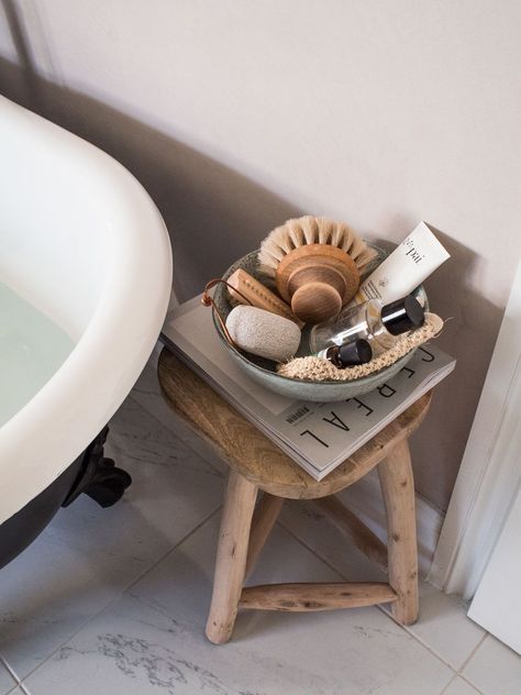 Time To Slow Down with C.P. Hart | Roll Top Bath | @styleminimalism Slow Living Bathroom, Holistic Bathroom, Bath Tray Styling, Bath Styling, Bath Table Trays, Earthy Interiors, Wooden Bath Tray Ideas, Bathroom Stool, Natural Bathroom