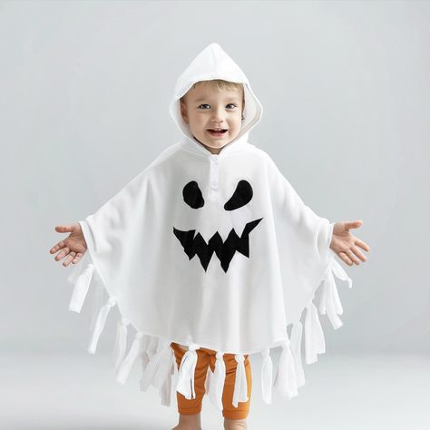 👻 Embrace the cuteness of Halloween with our Kids Ghost Costume, ideal for both boys and girls. You can pick from two delightful styles: the Tassel Poncho with a hat or the Hooded Cape Cloak Poncho, both offered in timeless black and white shades. Available in sizes for little ones from 1 year old to kids up to 5 years. 🎃 Perfect for "Trick or Treat" or any Halloween celebration, this costume brings a charmingly spooky vibe to the occasion. Designed for babies and toddlers, it's a unisex outfi Poncho Costume, Kids Ghost Costume, Toddler Ghost Costume, Ghost Costume Kids, Spooky Halloween Costumes, Ghost Halloween Costume, Ghost Costume, Kids Poncho, Ghost Diy