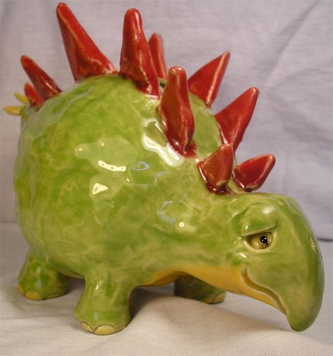 LESSON PLANNED!!Pinch pot dinosaur, another example for pinch pot project Double Pinch Pot Ideas, Pinch Pots Ideas, Double Pinch Pot, Pinch Pot Ideas, Teaching For Artistic Behavior, Clay Pinch Pots, Pots Ideas, Ceramic Pinch Pots, Clay Lesson