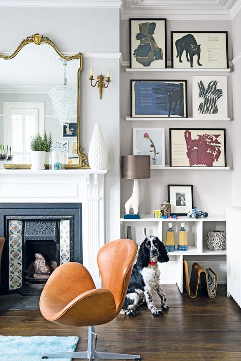 Plascon House Tour: A Scandi Delight in Pastel Tones Wall Books, English Townhouse, Fireplace Gallery, Alcove Shelving, Vintage Leather Sofa, Room Fireplace, Fireplace Room, Reclaimed Wood Dining Table, Wall Displays