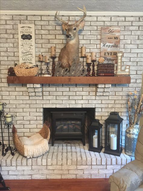 My whitewashed fireplace. So easy and I wish I'd done it a long time ago. Country Living Room With Deer Heads, Deer Mount Fireplace, Deer Head Over Fireplace, Fireplace With Deer Mount, Deer Mount Above Fireplace, Deer Mount Over Fireplace, Living Room Deer Mount Decor, Deer Mount Decor Family Rooms, Deer Head Decor Living Room Farmhouse