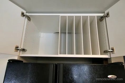 Cabinet Dividers For Cookie Sheets, Cookie Sheet Organization Diy, Diy Baking Sheet Organizer, Storing Cookie Sheets, Baking Sheet Organization, Over The Fridge Cabinet, Cookie Sheet Organizer, Baking Sheet Storage, Diy Kitchen Organizer