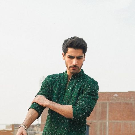 Faiza Saqlain on Instagram: "Crafted in a vibrant emerald green, Mehrdad boasts of a melange of katdana, sequin and, kora adornments on the shirt. The set comes paired with a shalwar that elevates the outfit to perfection. 💚 W A Z I R - Menswear Couture Collection Launching on 28th March at 9 pm (PST) #FSMan #FaizaSaqlain #Wazir #Faizasaqlainmenswear #Newcollection" Menswear Couture, Fashion Notebook, Faiza Saqlain, Wedding Outfits Indian, Bohemian Style Men, Kurta Men, Indian Man, Fashion Suits For Men, Fashion Suits